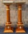 A pair of Neoclassical-style gilt-decorated mahogany and galleried marble top pedestals by Meroni Francesco for Versailles...