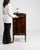 This piece presents as a side cabinet, distinguished by dark mahogany, single door, open showing shelf. Dating to 19th...