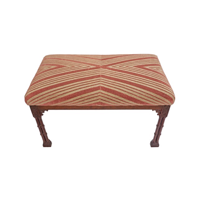A distinctive Chinese Chippendale style bench of generous proportions, with cluster-column legs composed of closely...