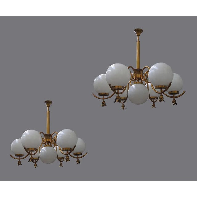 Large bronze and brass 20th century chandelier. Dimensions: diameter 1.30 m and height 1.10 m. I have official proof of...
