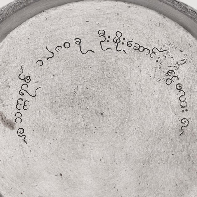 Antique 20th century burmese (myanmar) solid silver bowl of circular form, finely chased and pierced with detailed scenes....