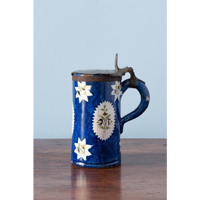 Height: 19 cm Diameter: 13 cm Light wear to glaze, commensurate with age and use. A crack along the body, stable. Features...