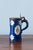 Height: 19 cm Diameter: 13 cm Light wear to glaze, commensurate with age and use. A crack along the body, stable. Features...