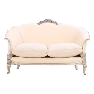 A French Louis XV Style Silver Leaf Carved Settee, C. 1930. For Sale