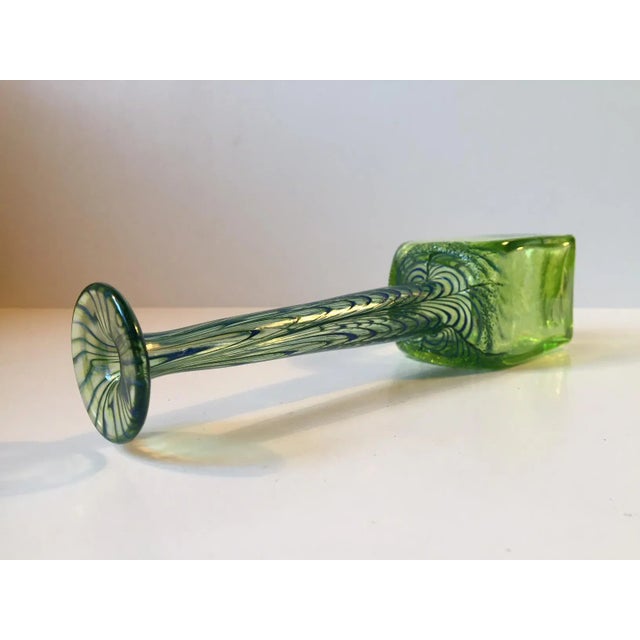 - Long-necked green infusion glass vase with blue spirals - Signed and numbered on base - Designed in the style of Anthony...