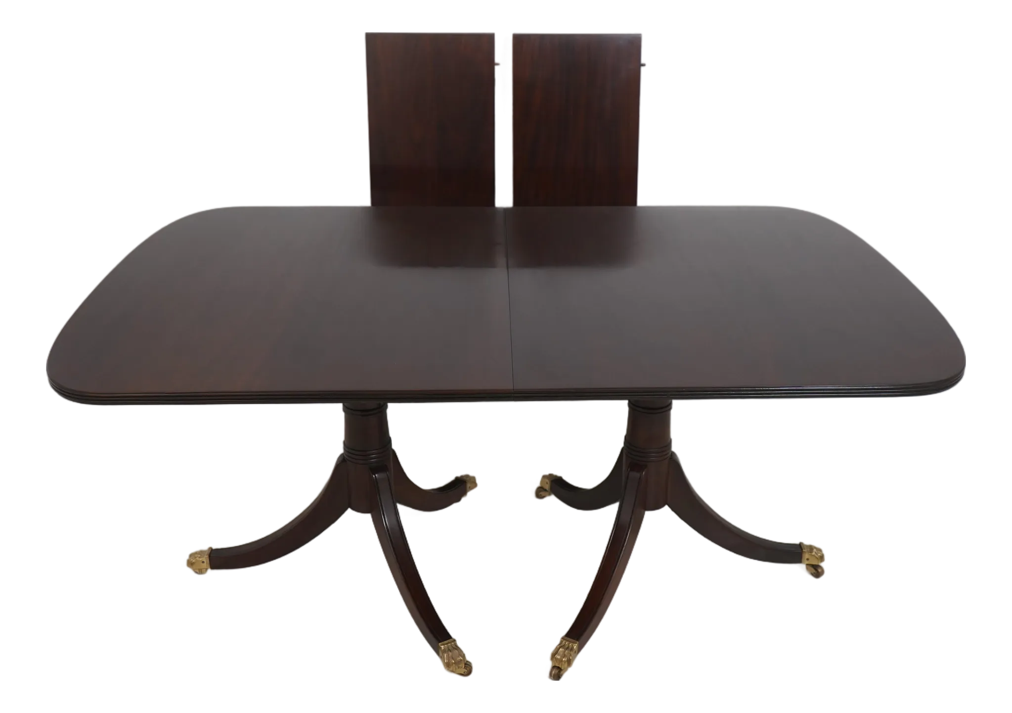 Dark wood dining table with curved legs on a white background.
