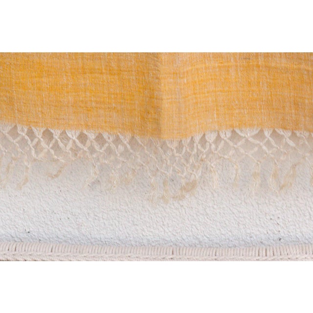 This throw represents the pinnacle of "Slow Fashion" for the home. Hand-crafted in rural Assam, India, it is woven from...