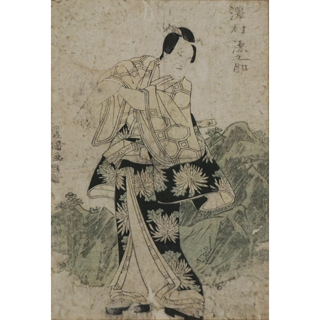 Kabuki Actor in Water Lily Robe with Samurai Sword- Japanese Woodblock Print Finely detailed woodblock by Utagawa Toyokuni...
