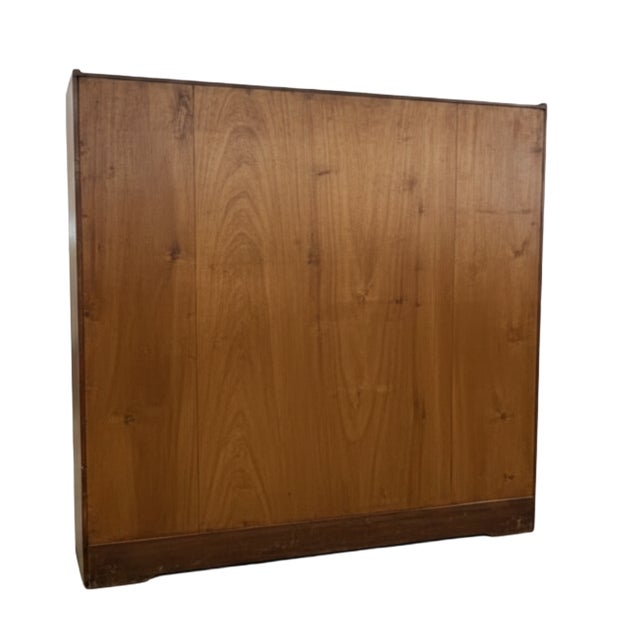 All original double-door oak Arts & Crafts/Mission-style bookcase featuring leaded glass, adjustable shelves and unique...