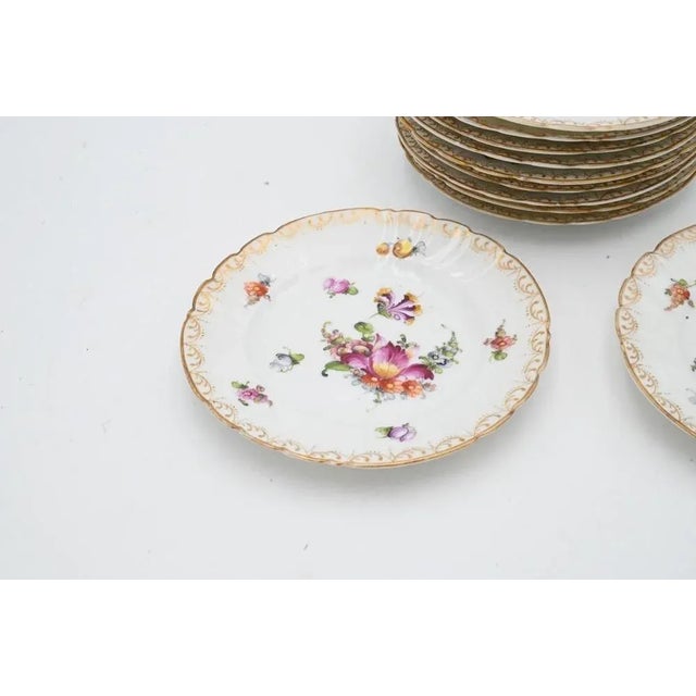 Very pretty Marked Meissen Bread and Butter Plates, Set of 11, in a Floral Pattern, From Dresden Germany.