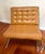 Nice pair of vintage Barcelona style lounge chairs by Selig Furniture. The chairs feature tufted yellow ochre leather...