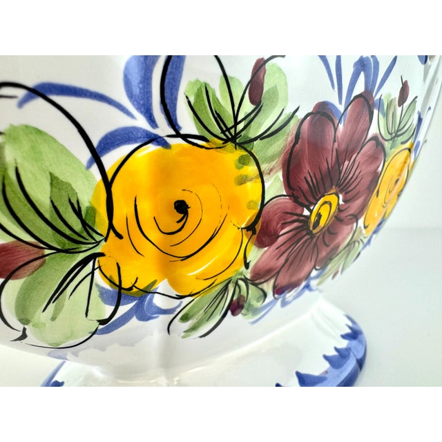 This exquisite vintage ceramic bowl, hand-painted by Yestaly in Alcobaça, Portugal, features a stunning floral design in...