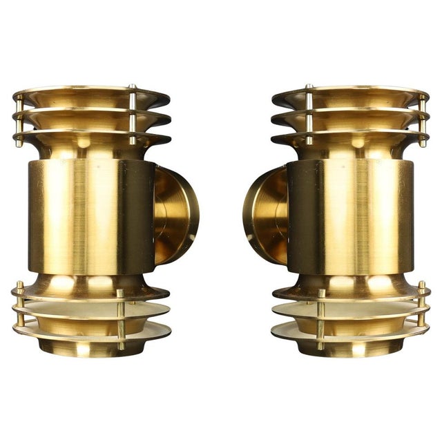 This mid-century modern brutalist brass wall sconce from prague dates back to the 1960s. Its design is characterized by...