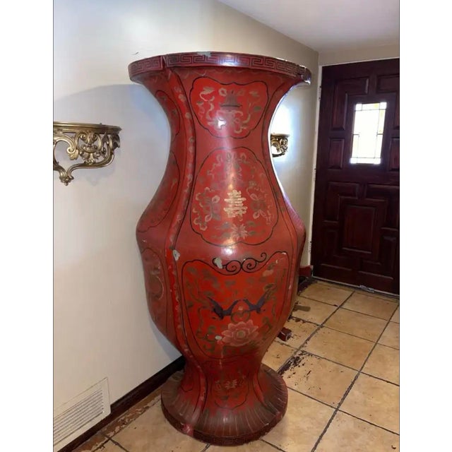 Impressive oversized Chinese red lacquer papier-mâché floor vase with matching carved stand. Beautifully hand-painted with...