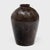 This large ceramic jar is a vintage Chinese wine vessel from the early 20th century, originally used for aging wine and...