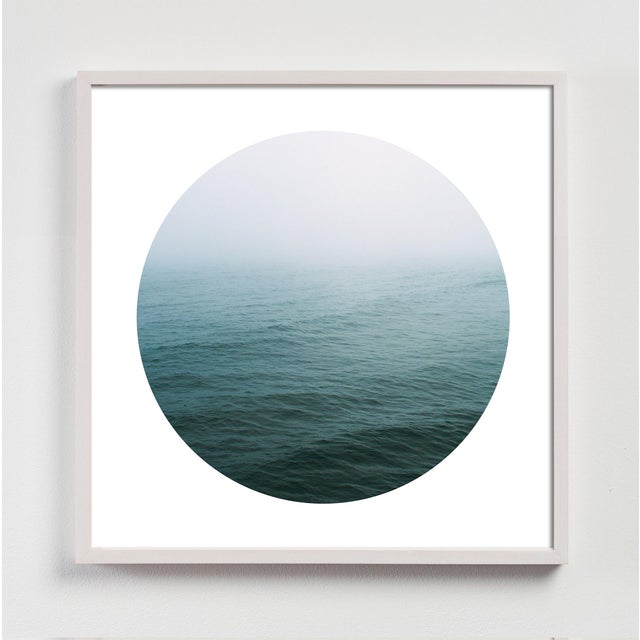 An almost abstract foggy scene off the Pacific Coast in a cool circular format useful for breaking up the visual patterns...