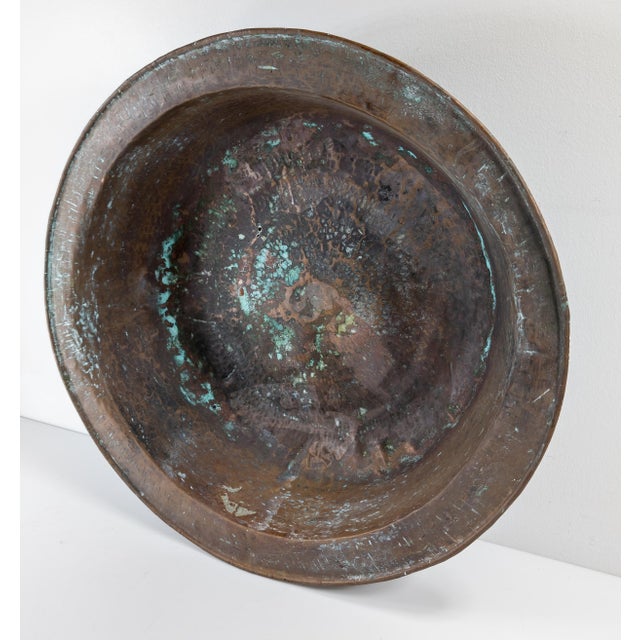 We are selling this primitive hand hammered copper basin with verdigris patina. The basin was originally probably for...