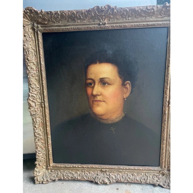 This antique original oil painting depicts a folk art style portrait of Senator Henry Crouse's wife Harriett. The painting...