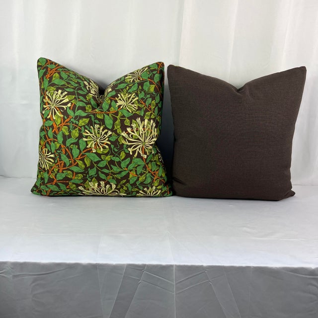 Custom-tailored 20” pillows in Morris & Co. “Honeysuckle”. Pattern is random cut. Backs are Norbar Noble Arabica brown....