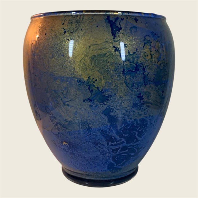 6” high 5” wide, reverse painted abstract design with copper painted interior, no flaws, excellent condition.