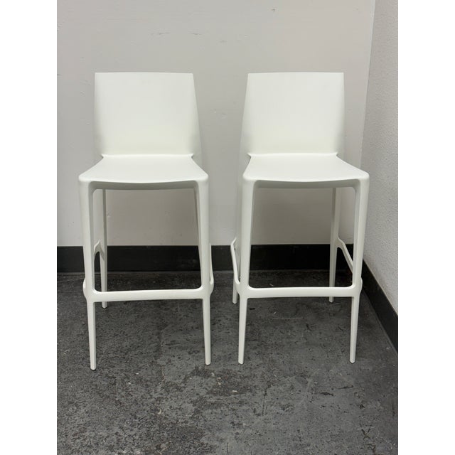 Design Plus Gallery presents a Pair of Bellini Barstools by Mario and Claudio Bellini for Heller. The stools are presented...