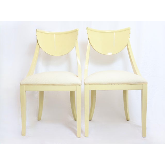 Pair of Pietro Costantini for Ello Furniture Mfg. Co. klismos style dining side chairs. High polished dark cream / butter...