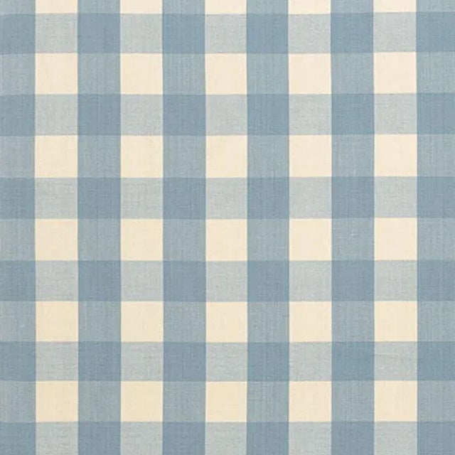 A classic one and a half-inch buffalo check, this woven cotton is a wonderful complement to both prints and plains. Sold...