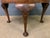 A lovely round coffee table in the Queen Anne style. Of generous proportions and of good construction in solid walnut with...