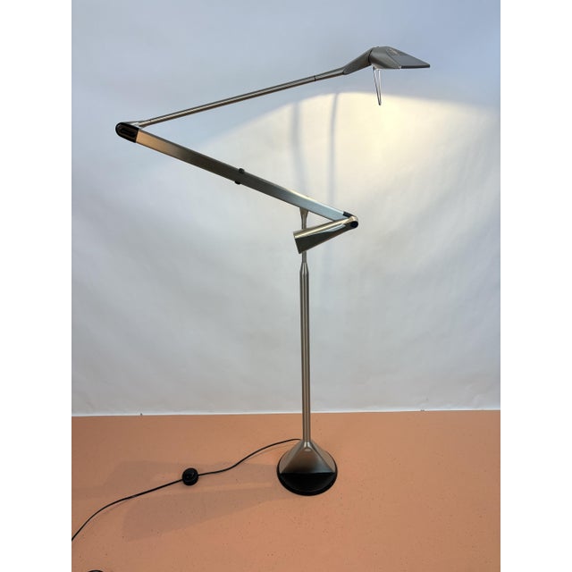 Italian design lamp from the brand Lumina designed by Walter Monici. The lamp has a foot switch and can be set to two...