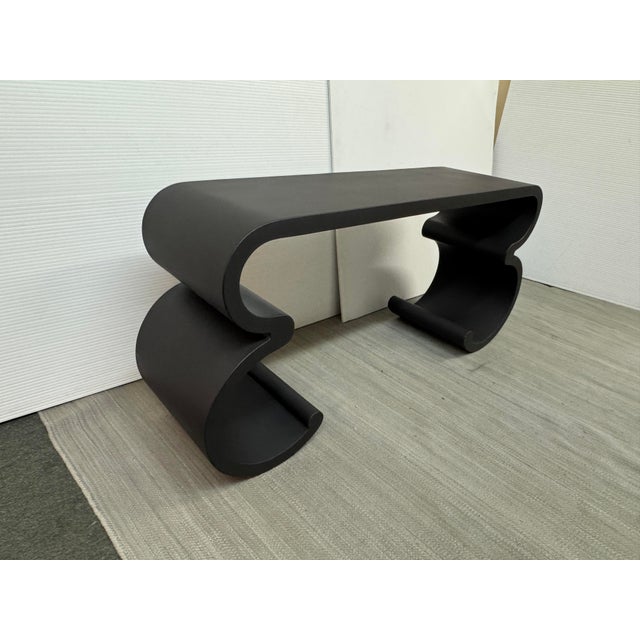 Design Plus Gallery presents a Console Table in the style of Karl Springer. The console has opposing full-scroll supports...