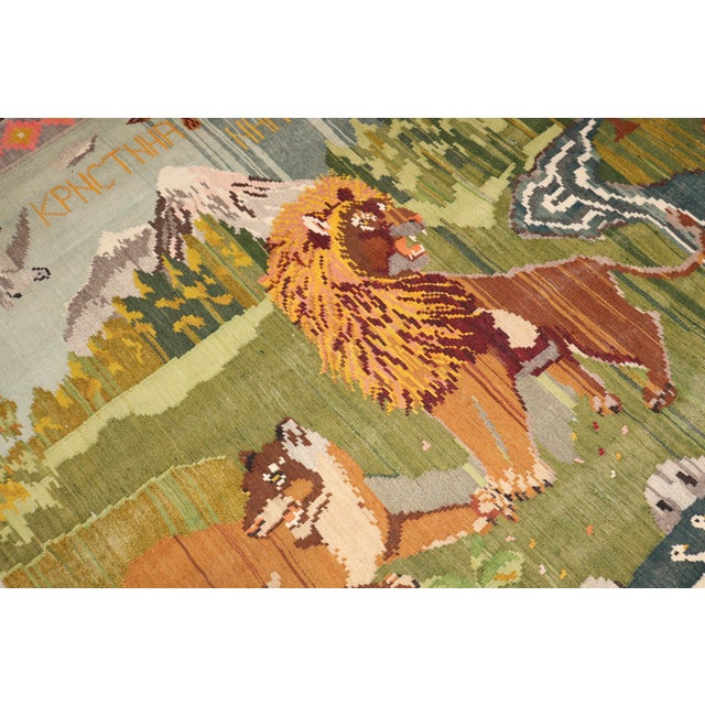 3rd quarter of a 20th century Turkish Kilim with a scenic animal motif design given as a dowry gift Measures: 6'5'' x 7'9''.