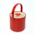 Red ice bucket. This is an eccentric Georges Briard fire truck-red faux patent leather ice bucket in a cylindrical shape...
