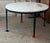 52” round custom made table. Marble top and blackened steel base. Good condition. Very heavy.
