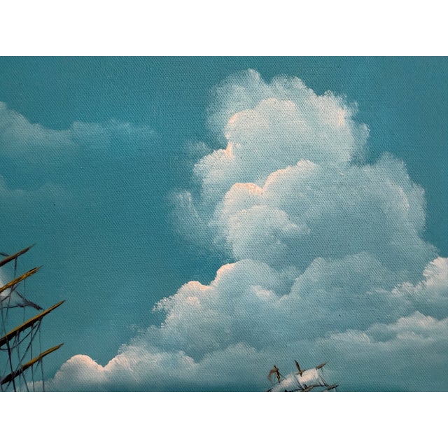 A beautifully executed marine oil painting by T.J. Lee, depicting two majestic tall ships navigating rolling ocean waves...