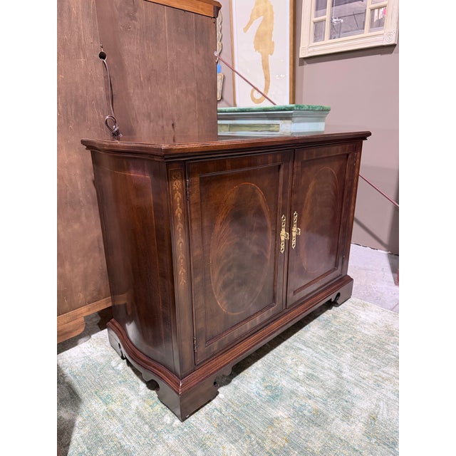 A distinguished vintage bar server by Drexel Heritage from its Heirloom collection, showcasing richly figured mahogany...