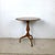 A refined pedestal accent table from the Oxford collection by Weiman, featuring a richly figured burl veneer top protected...