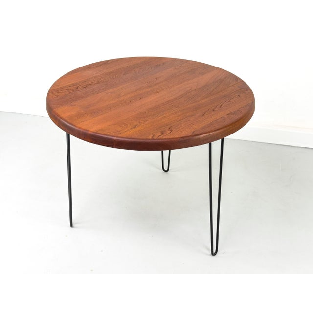 High-quality round dining table ideal for a small kitchen, for example. The solid teak tabletop was manufactured in...