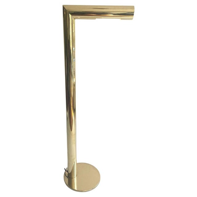 Two minimalist brass floor lamps designed by Jonas Hilde for Hovik Lys AS, Norway, circa 1980. They create downwards...