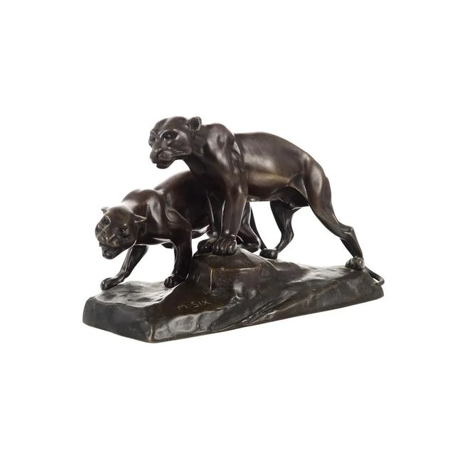 A Michael Six pair of mountain lions sculpture. Original 1920s bronze sculpture, signed. Michael Six (1874 - 1938) was...