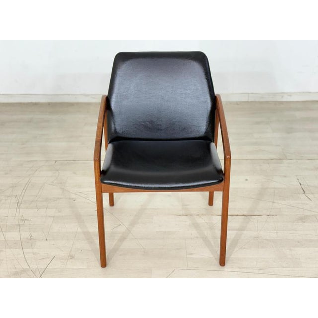 Beautiful, timeless armchair (model 23) by Henning Kjærnulf for Korup Stolefabrik (Made in Denmark) in true Danish mid-...
