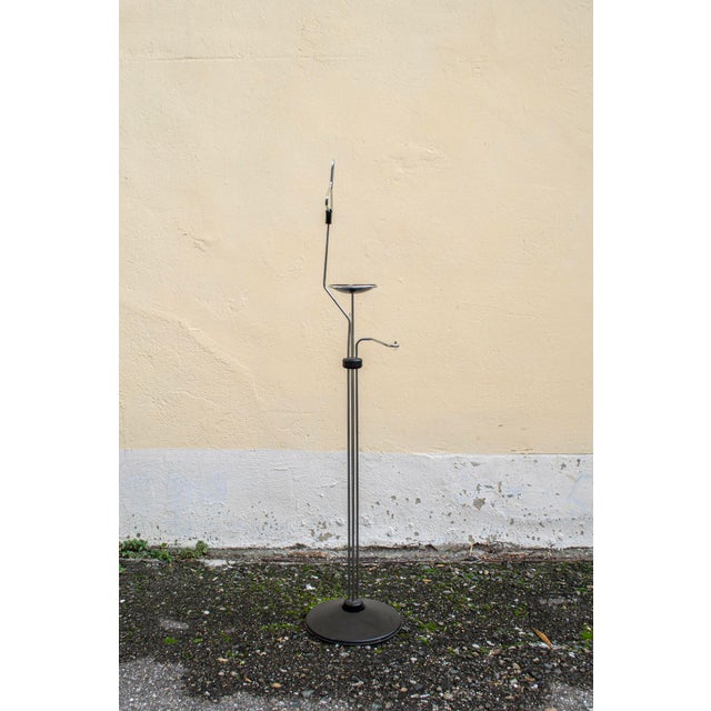 Valet stand with chromed metal frame, painted metal base, and plastic details. Designed by Raul Barbieri and Giorgio...