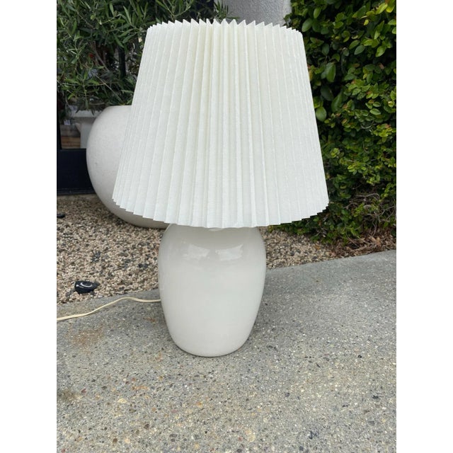 The cutest small white table lamp with pleated shade! We love the pleated shade on this lamp! The white ceramic base is...