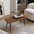 This 1960s side table boasts a perfectly sharp silhouette. The stark, mechanical lines of four tapered black legs,...