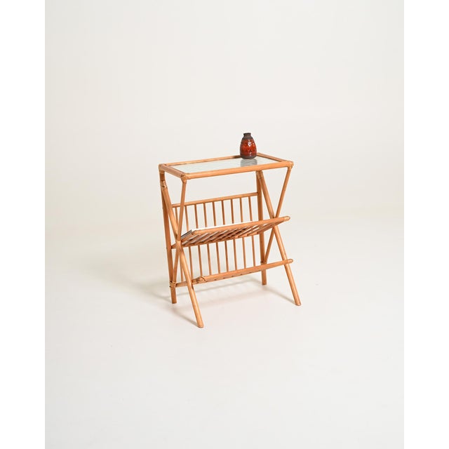 Rattan magazine rack with double side compartment and printed glass top. Swedish production, 1960s. Bamboo magazine rack...