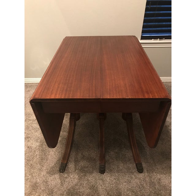 1930s Traditional Duncan Phyfe Mahogany Three Pedestal Drop Leaf Dining