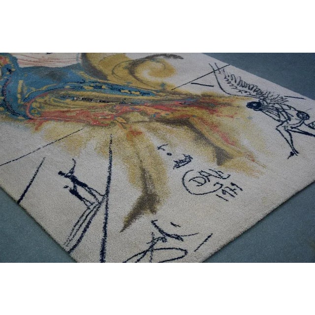 Rare "Le Grand Pavon" rug created after Salvador Dali´ in 1979. The rug is in great vintage condition. Made of pure new...