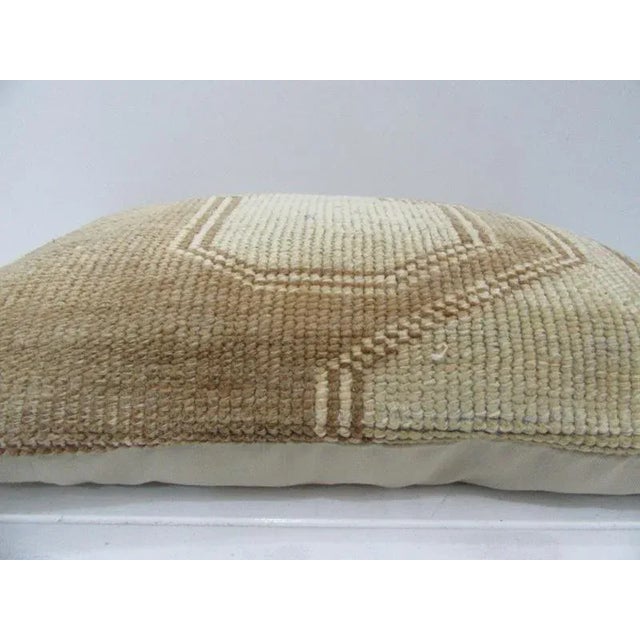 This is a pillow cover made from a vintage kilim rug. The piece was properly washed and ready to use. Pillow inserts not...