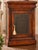 This distinctive solid-wood cabinet combines richly toned woodwork with beautifully engraved metal panels for an unusually...