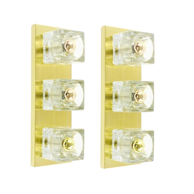 Stunning high quality crystal glass & brass wall lights/sconces from Peill & Putzler (Germany, 1970s). Made of thick high...