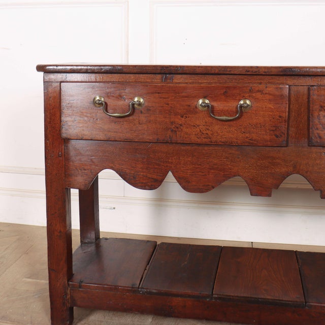 Pretty little Welsh 2 drawer dresser base with great colour. 1760 This piece is designed in the style of the selected...
